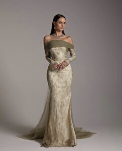 Woman in elegant lace white and green dress 